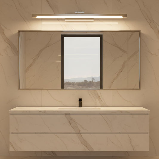 Lorvali modern linear bathroom vanity light with white acrylic shade mounted above a mirror in a marble bathroom.