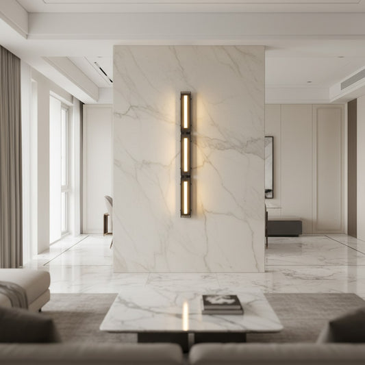 Lorvali minimalist modular black iron and smoky acrylic linear LED wall light mounted on a white marble feature wall.