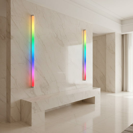Lorvali RGBIC smart LED wall sconces mounted on a marble wall, displaying vibrant rainbow lighting effects.