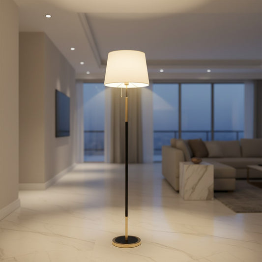 Lorvali vintage wrought iron floor lamp with a white fabric shade and black and gold metal stand in a modern living room