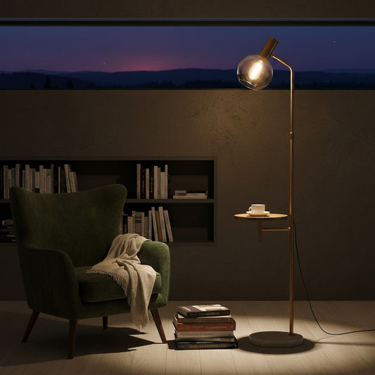 Lorvali Widar modern gold floor lamp with marble base, integrated side table, and amber glass shade in a cozy room.